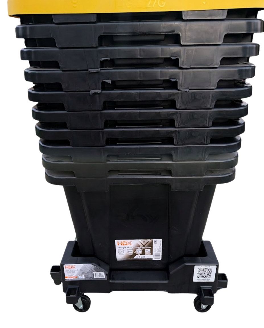 Stack of 27-gallon black HDX heavy-duty rental moving totes with yellow snap-on lids — reusable moving boxes delivered in Binghamton, NY